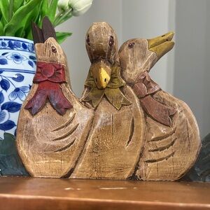 Hand carved and painted wooden duck shelf